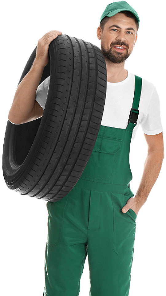 A man holding a tire in front of a white background showcases our franchise marketing expertise.